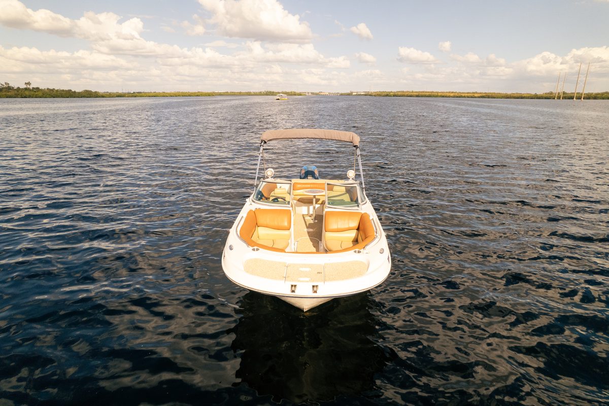 Aerial bow view of Adventure I head-on on open water.