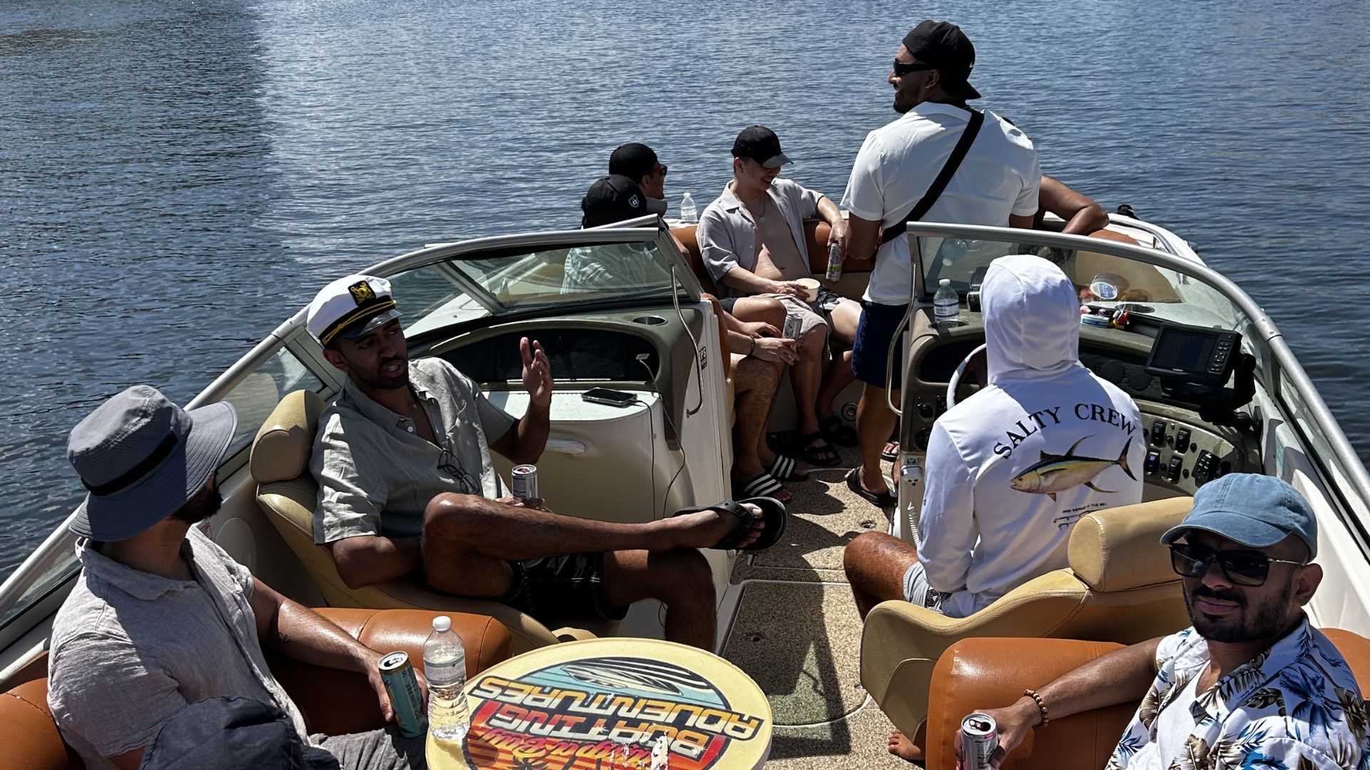 Bachelor party group enjoying a captained boat charter in Tampa Bay.