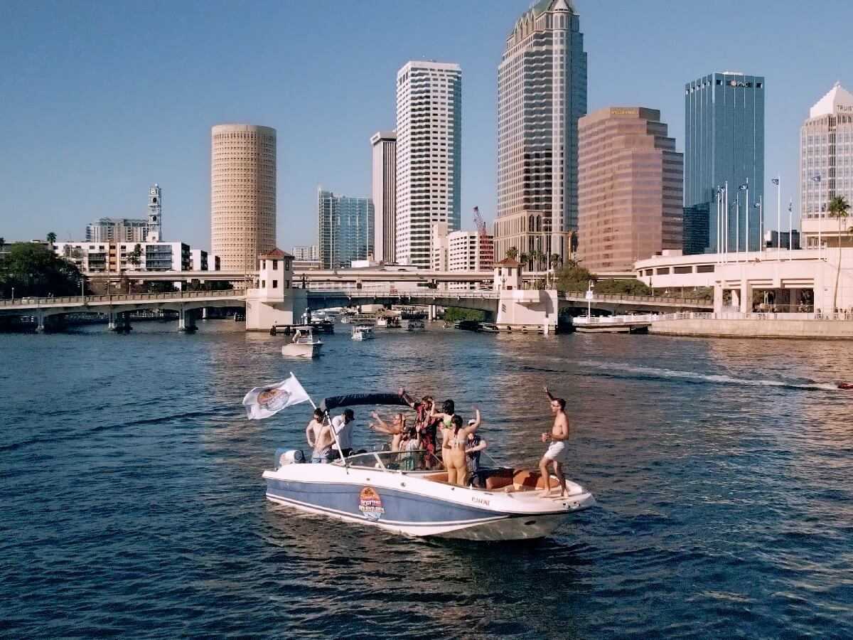 Drone shot of a full-day deck boat tour through Tampa Bay.