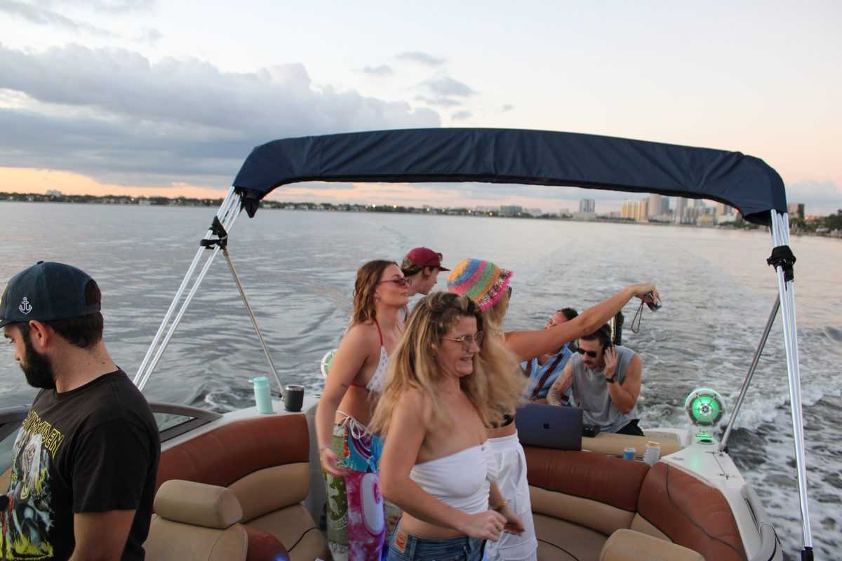 Group gathered at the bow at dusk on Tampa Bay.
