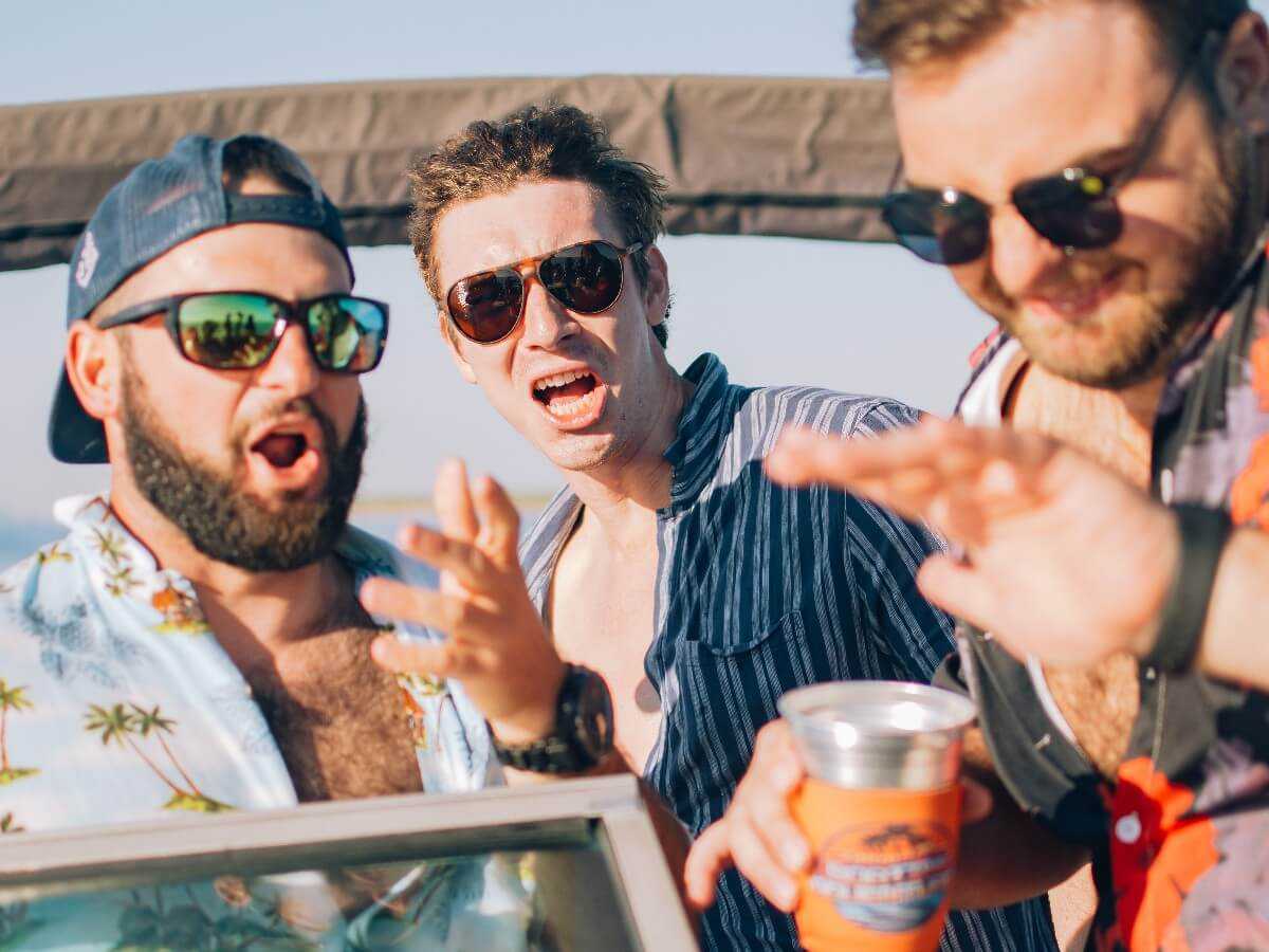 DJ and guests enjoying the ride on a Tampa Bay charter.