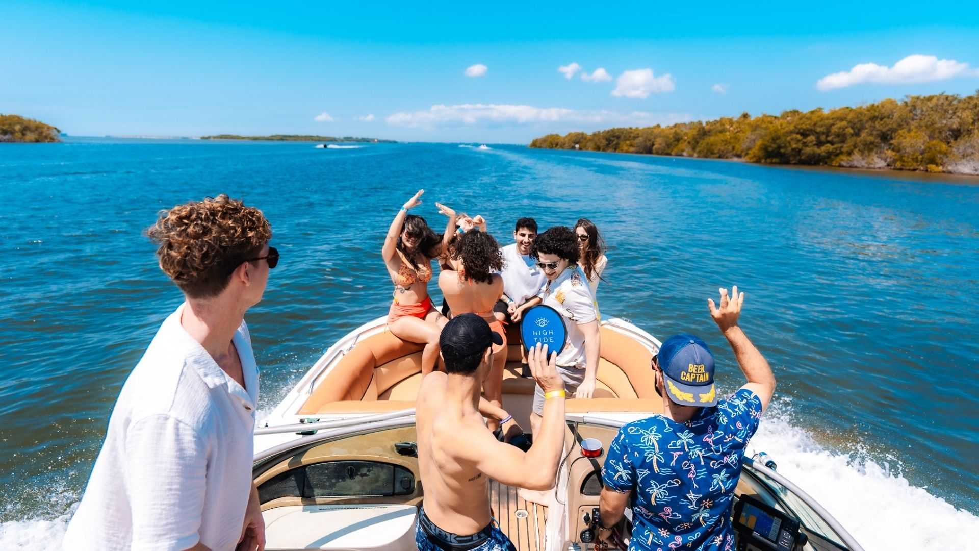 Group of friends partying on a boat in Tampa Bay, FL.