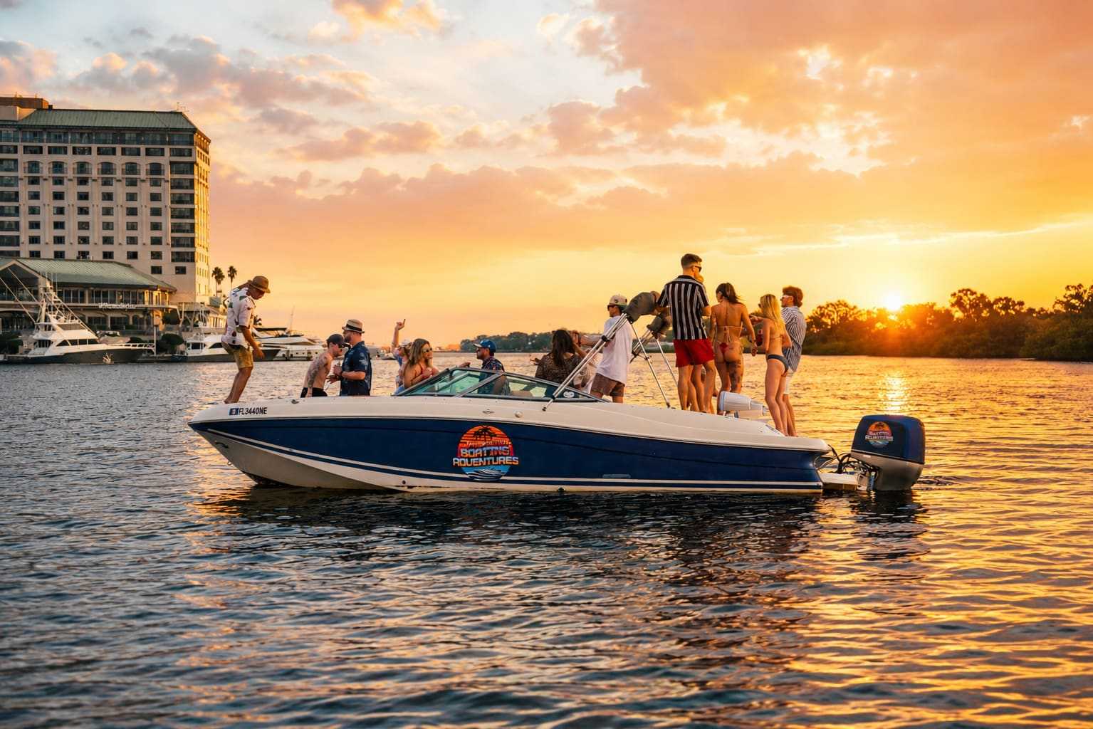 Friends on deck during a Tampa Bay sunset cruise.