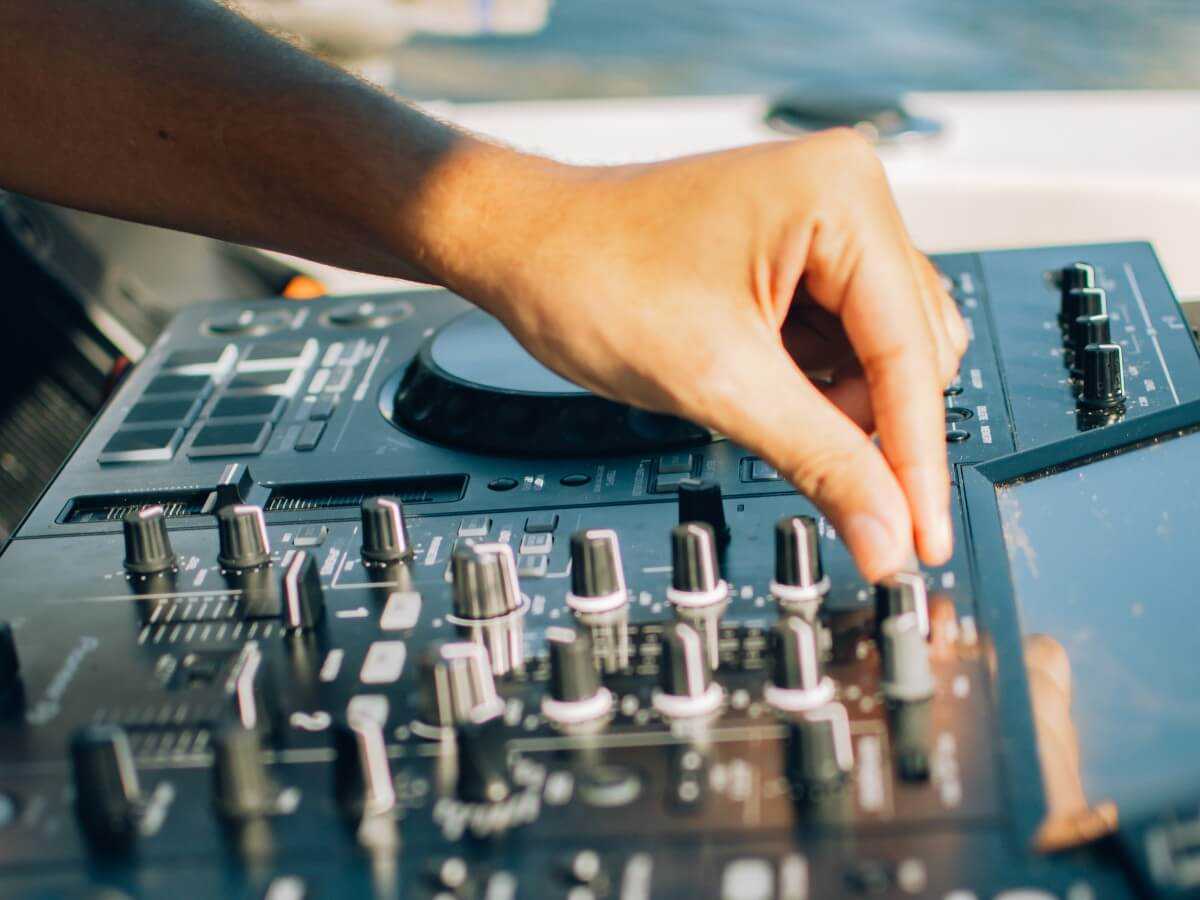 Close-up of the DJ mixer set up on the boat.