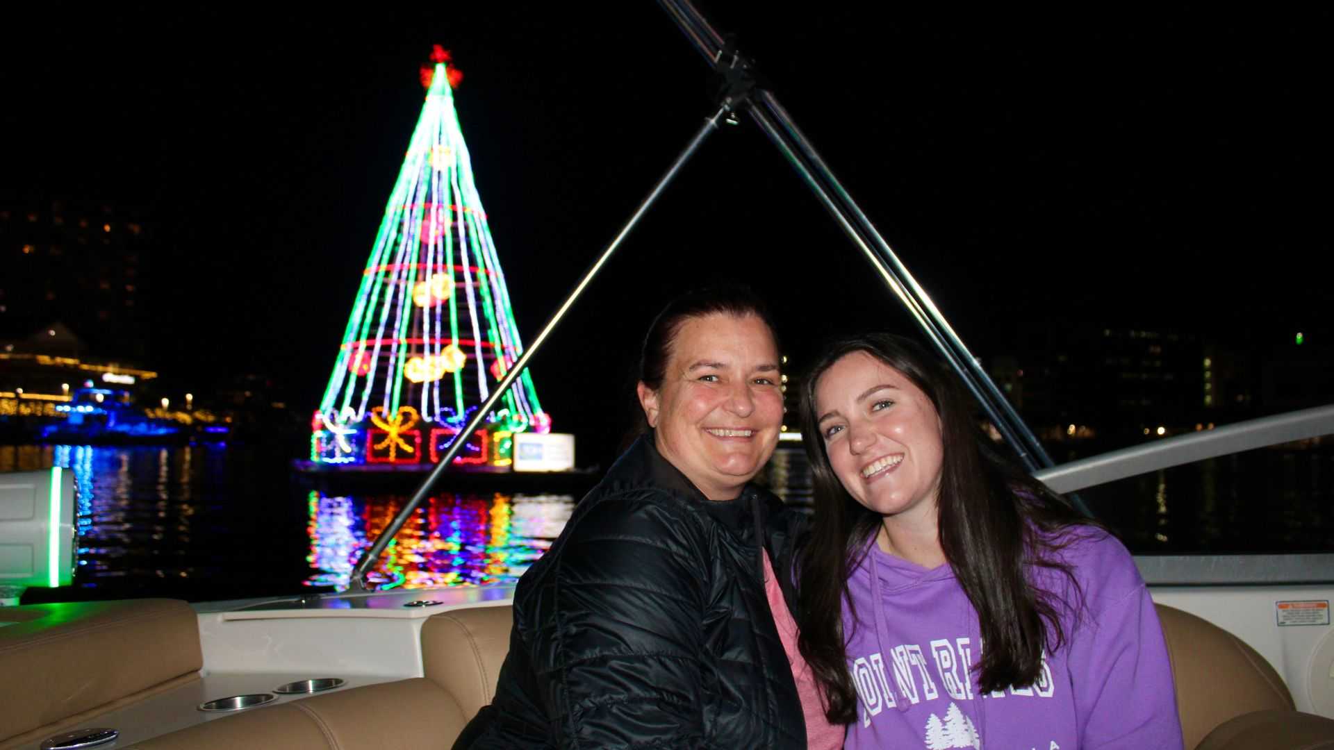 Christmas lights reflecting on the water near downtown Tampa.