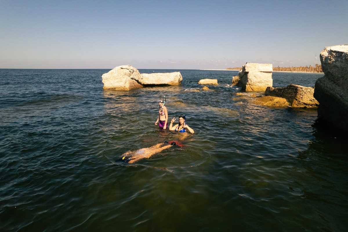 Swimming off the boat near the rocks in Tampa Bay.