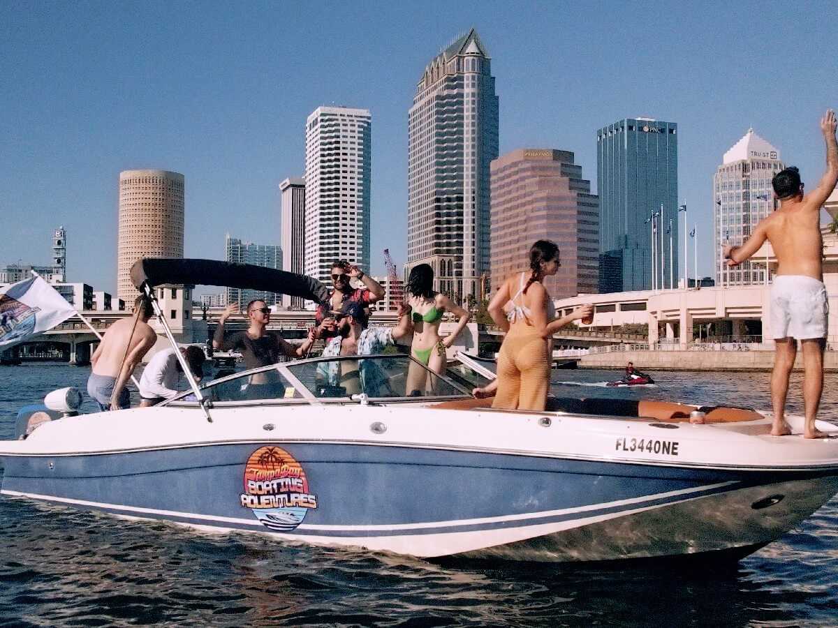 The charter boat under way with the Tampa skyline behind.