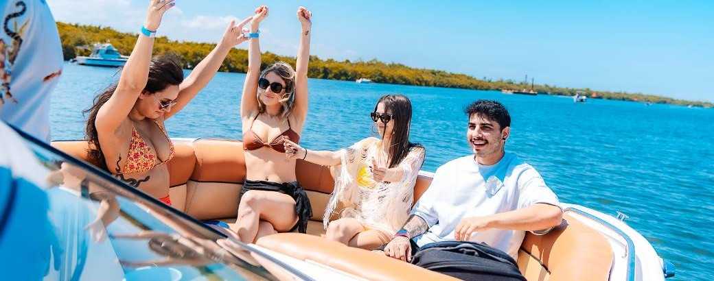 Friends talking on a party boat in Tampa Bay, FL.