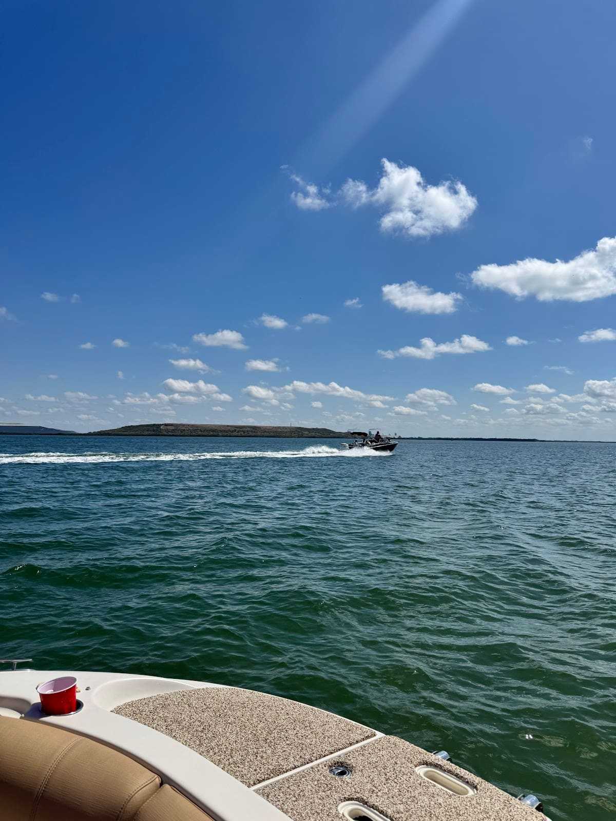 Open water view from the bow while cruising Tampa Bay.