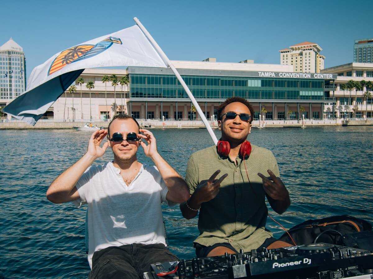 DJs on board passing the Tampa Convention Center.