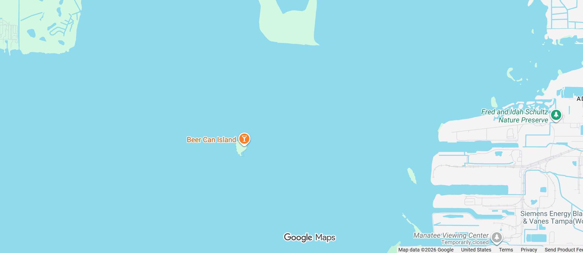 Map of Tampa Bay showing Beer Can Island labelled and pinned in open water, with the Apollo Beach shoreline to its east.