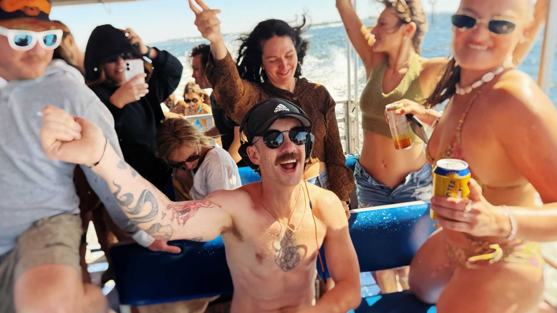 Group of friends partying on a boat in Tampa Bay, FL.
