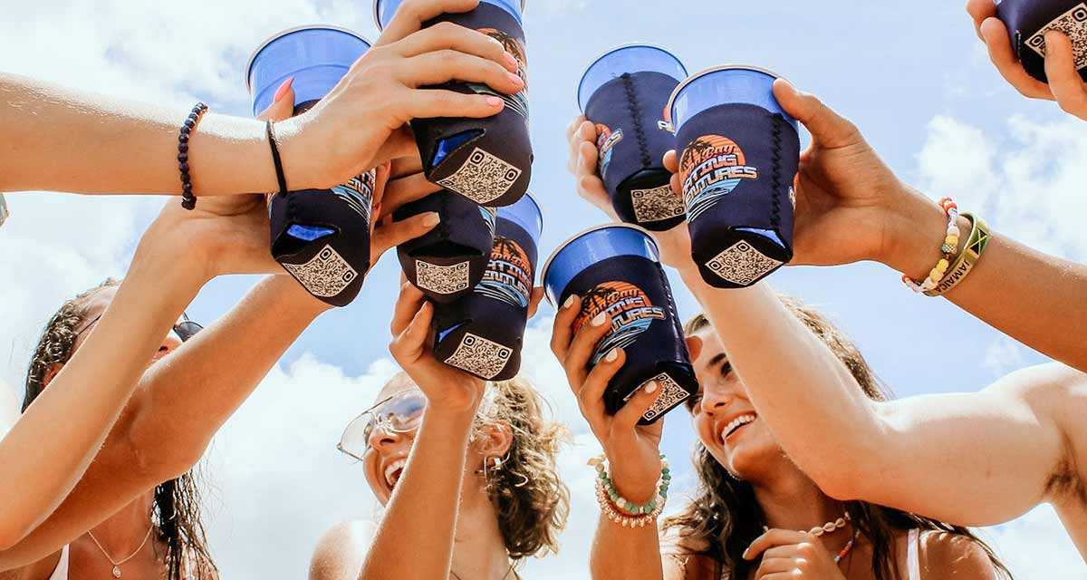 Friends toasting drinks at a charter boat party in Tampa Bay, FL.