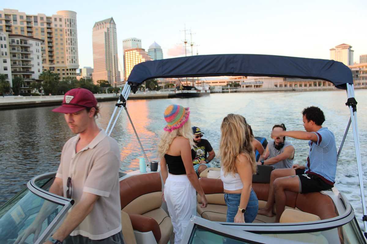 Group cruising past downtown Tampa near Harbour Island.